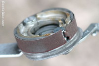 strip of emery cloth wrapped around brake shoes