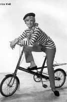 period photo of shirley marissa mell on moulton bike